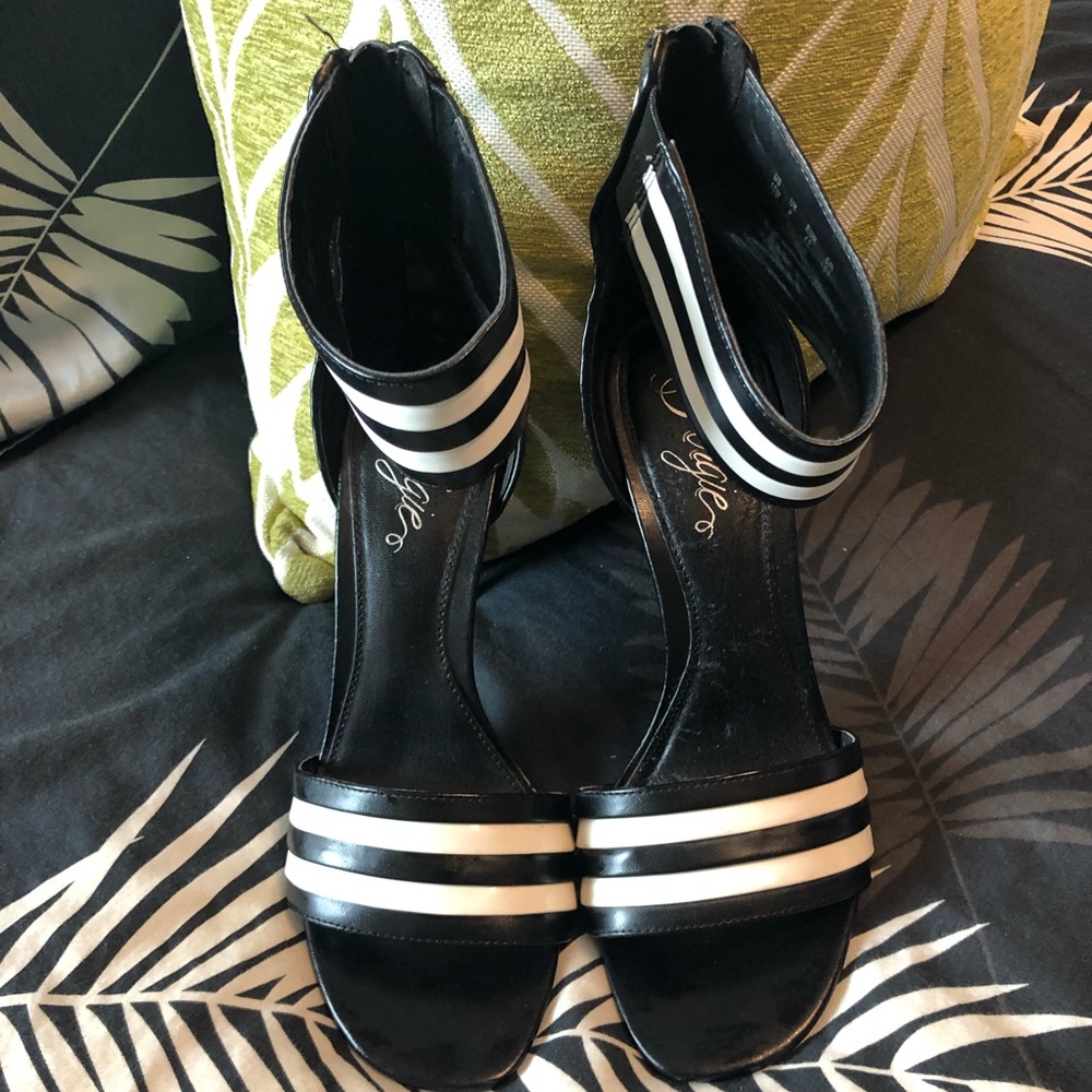 Black and white unique heel.